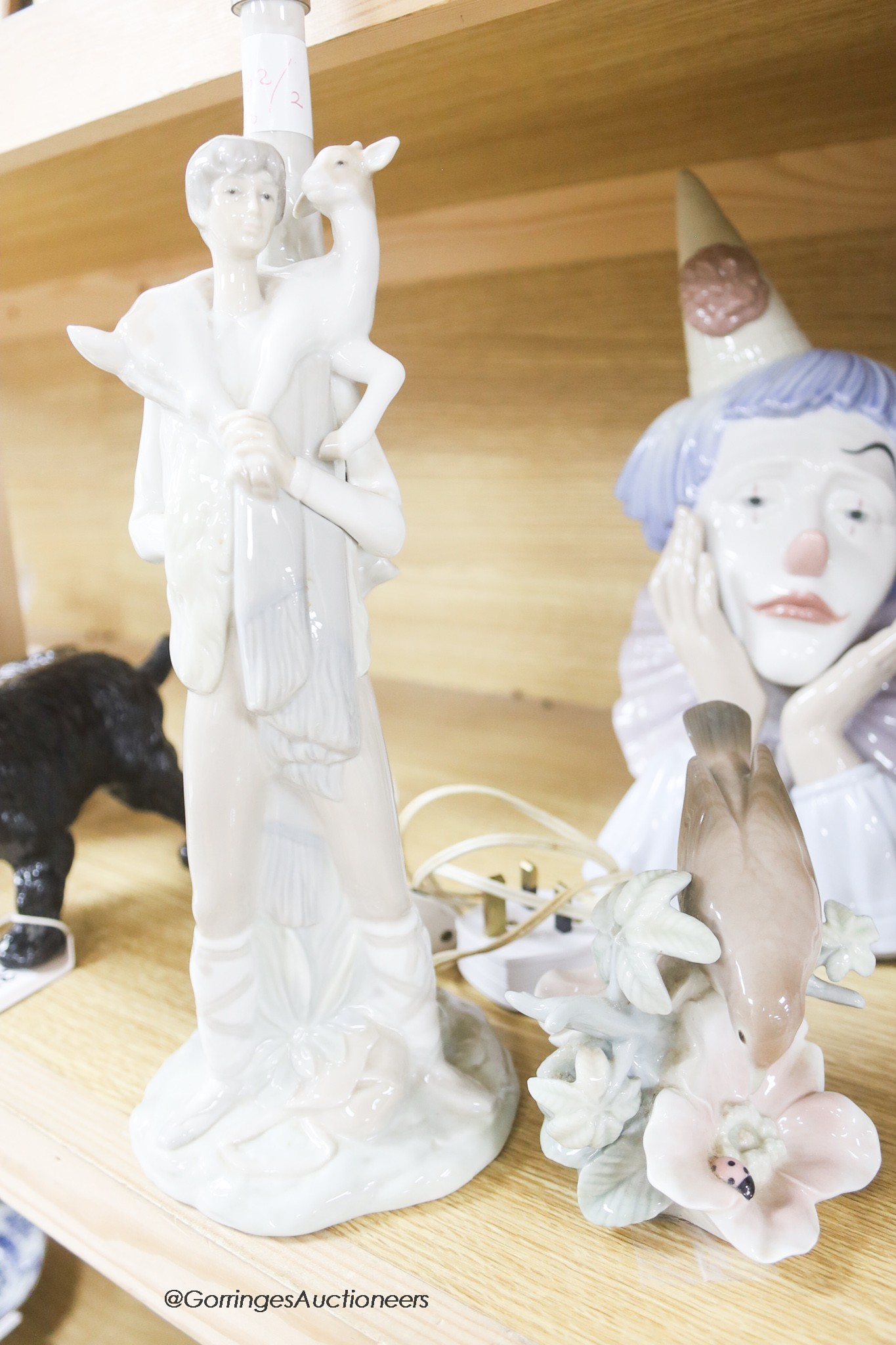 Two Lladro heads and other Lladro pieces